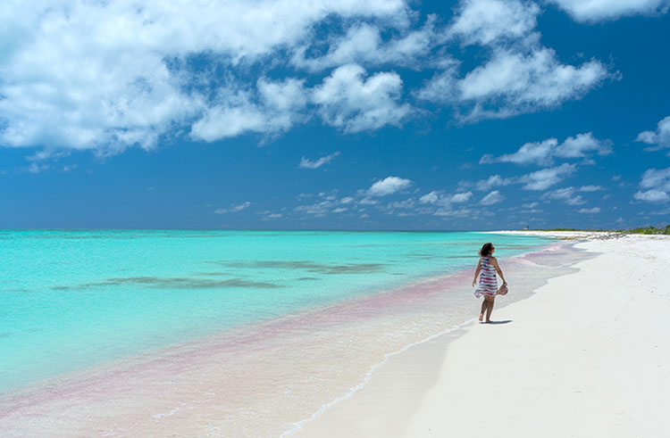 You Probably Aren’t That Good in Geography, But If You Are, Try This Quiz sunbathing Woman Walking On White Sand Beach, Caribbean