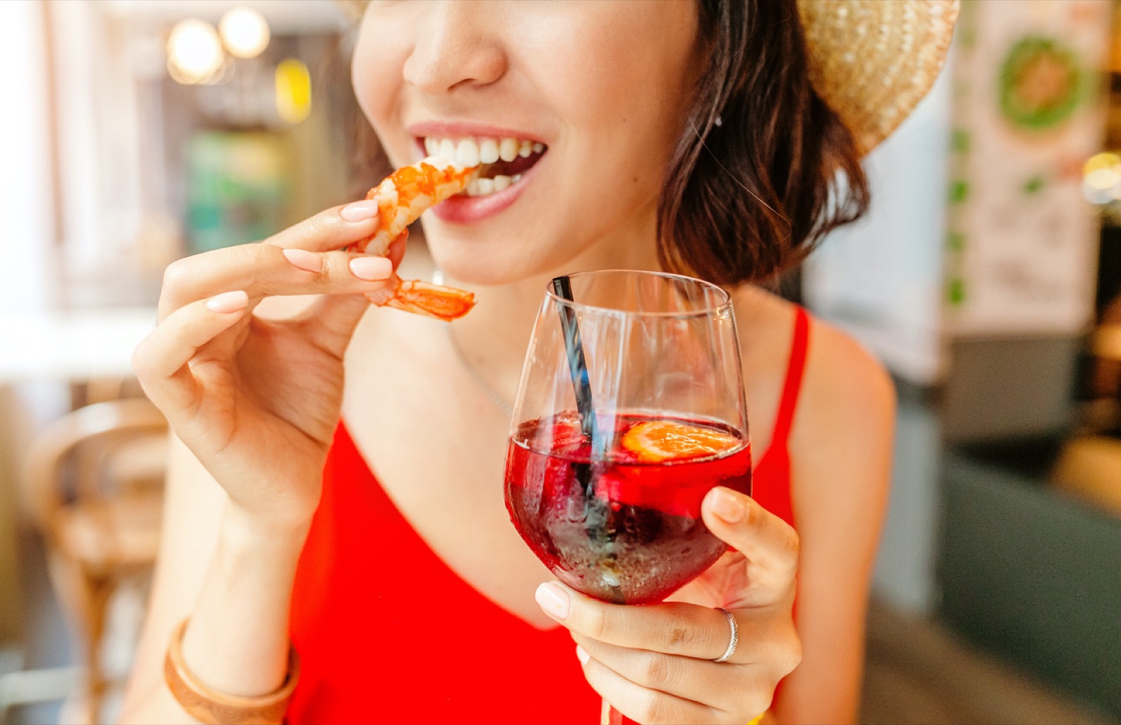Happy Asian Woman In Hat Eating Local Spanish Cuisine Grilled Seafood