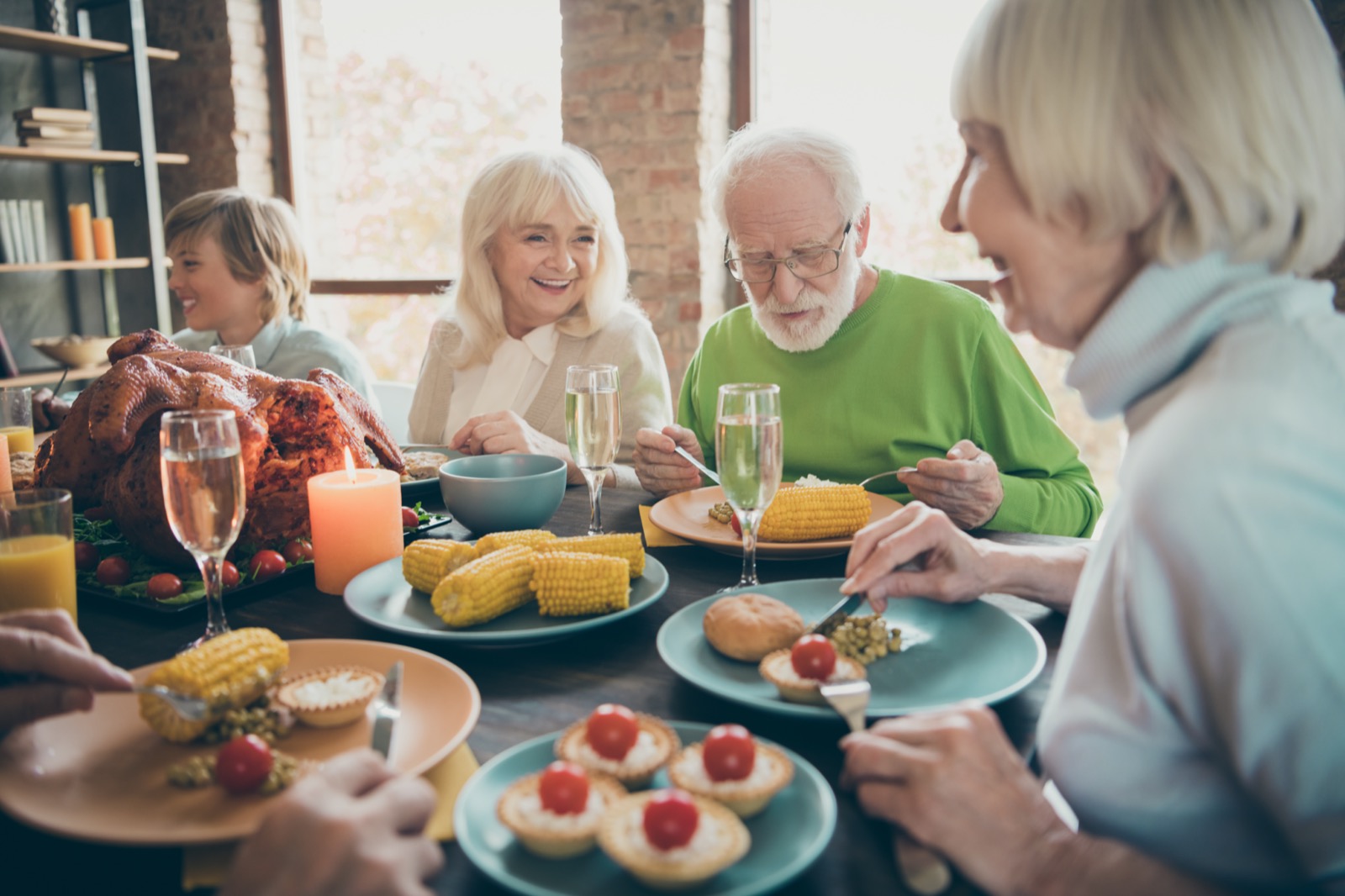 It’s Easy to Tell If You’re More American, British or Australian Just by Your Eating Habits Portrait Of Nice Lovely Cheerful Cheery Friendly Big Full Family Eating Brunch Lunch Delicious Autumn Fall Season Tradition Generation Gathering In Modern Loft Industrial Style Interior House