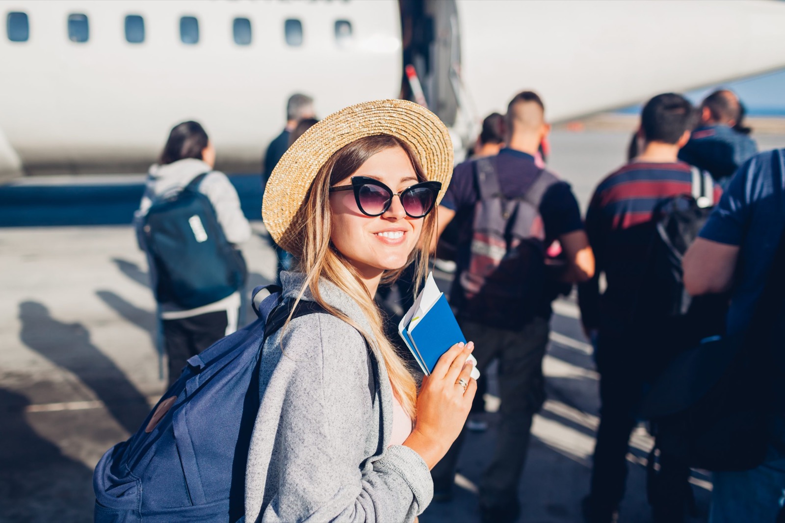 Coffee Trivia Quiz Woman Traveler Boarding On Plane Holding Passport