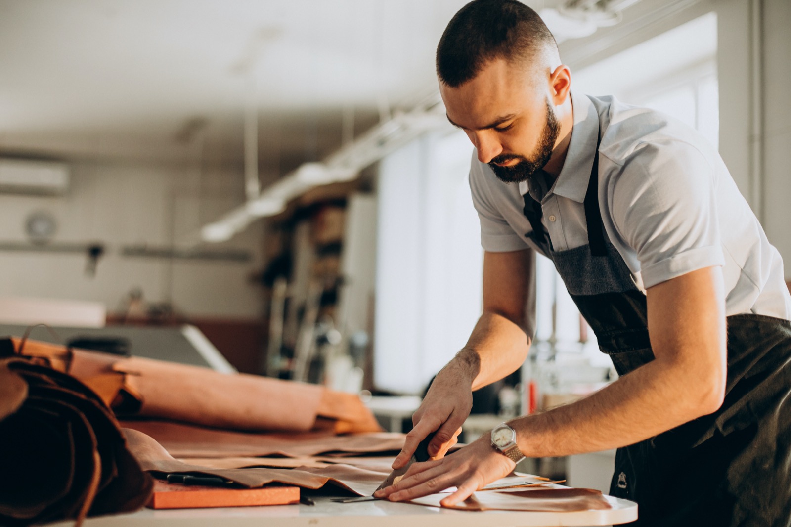 Honestly, It Would Surprise Me If You Can Get 💯 Full Marks on This Random Knowledge Quiz Male designer and leather tailor working at a factory