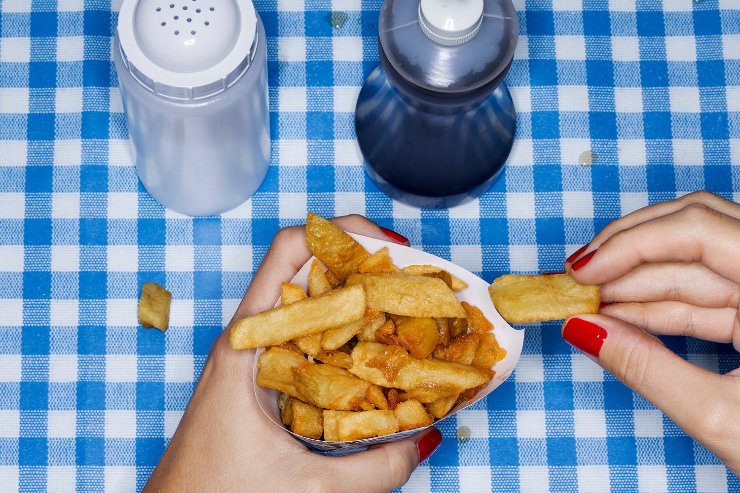 Take a Trip to New York City to Find Out Where You’ll Meet Your Soulmate eating chips fries snacks