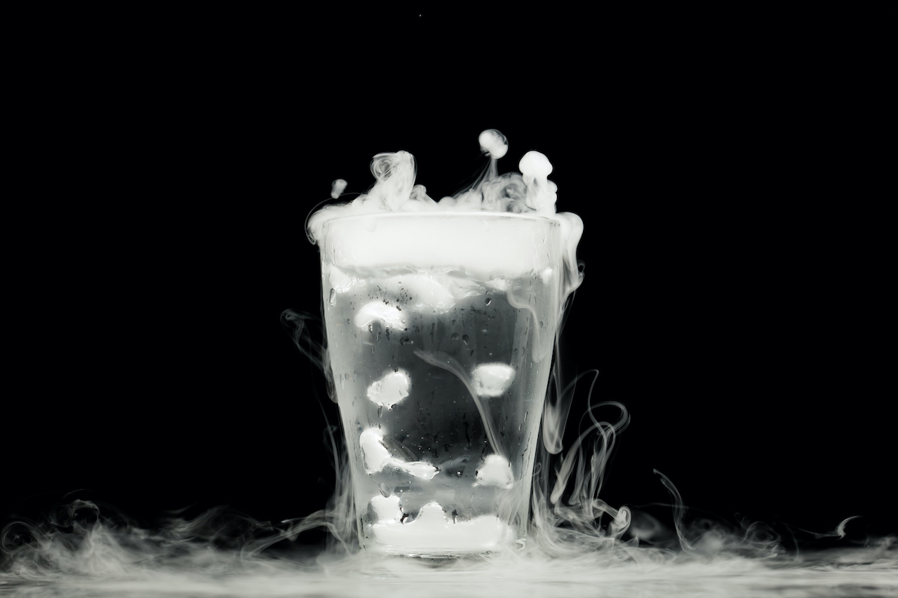 glass of water with ice vapor