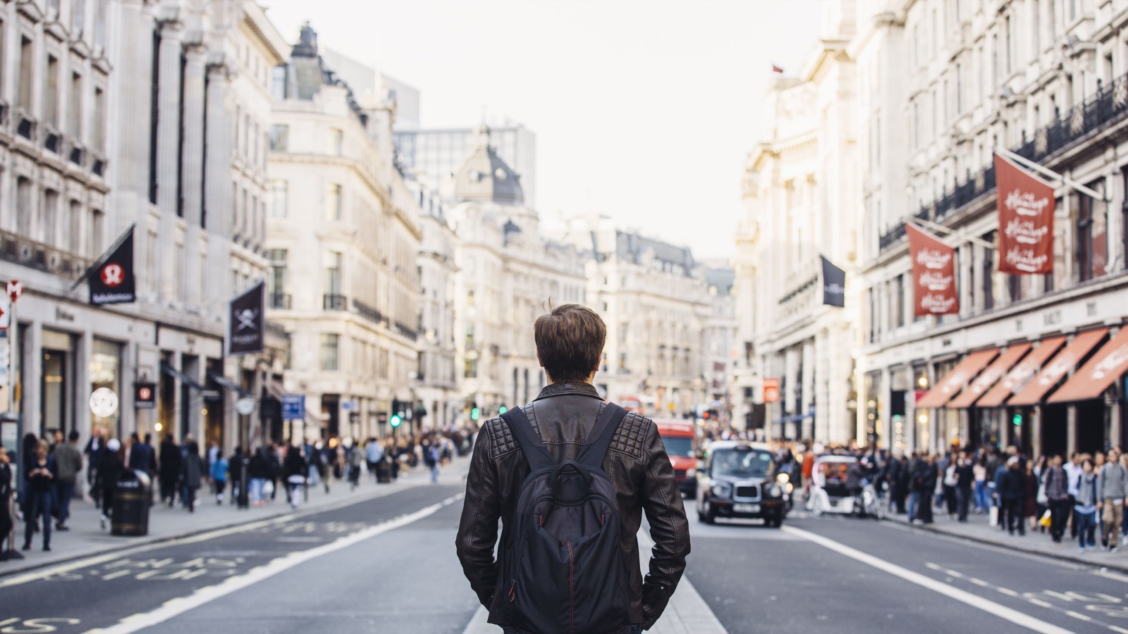 Tourist Touring the city Regent Street In London, United Kingdom UK