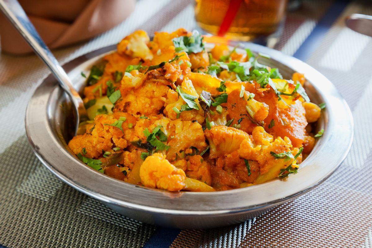 🥟 Unleash Your Inner Foodie with This Delicious Asian Cuisine Personality Quiz 🍣 Aloo gobi (potato and cauliflower dish)