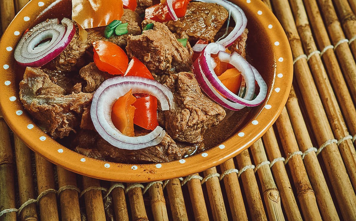 Nigerian cuisine Asun (spicy smoked goat meat)