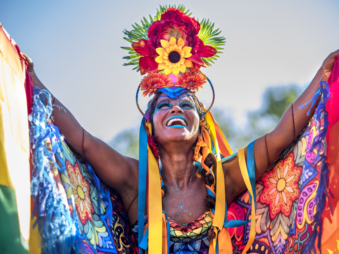 Can You Conquer All 7 Continents in This 30-Question Quiz? Brazilian Woman Wearing Colorful Costume for Rio Carnival, Brazil