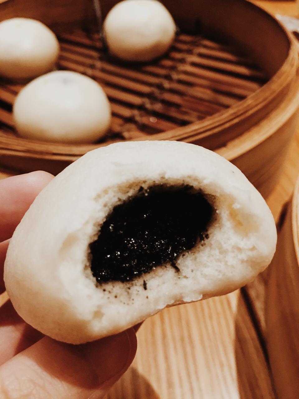 Eat a Mega Meal and We’ll Reveal the Vacation Spot You’d Feel Most at Home in Using the Magic of AI Black sesame steamed bun