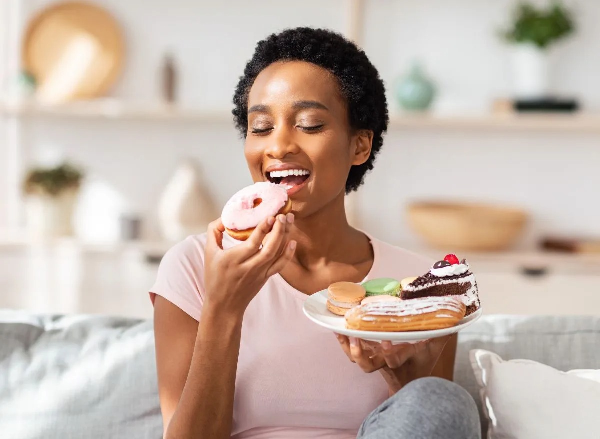 Choose Between Sweet and Salty Snacks and We’ll Guess Your Current Relationship Status Woman eating sweets doughnut cake