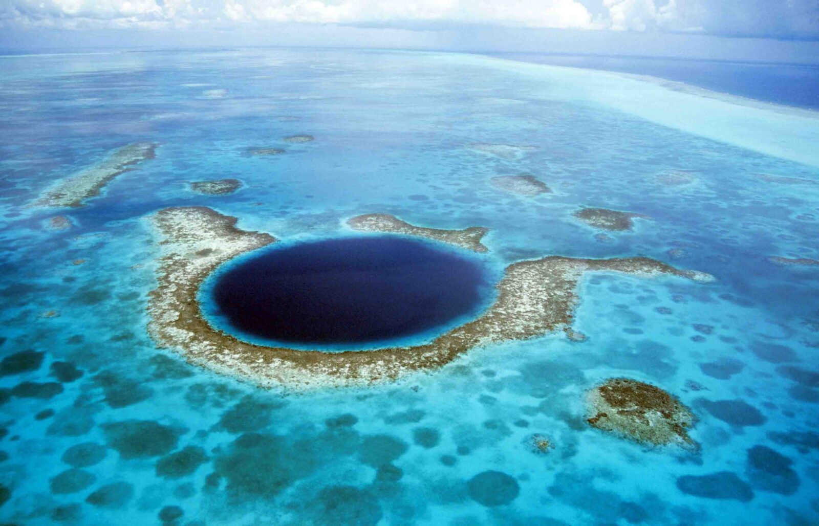 Can You Match These Extraordinary Natural Features to Their Respective Countries? Great Blue Hole, Belize Barrier Reef