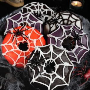 Eat Halloween Snacks To Reveal Your Horror Movie Fate Quiz Spider-web frosting doughnut