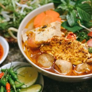 🥟 Unleash Your Inner Foodie with This Delicious Asian Cuisine Personality Quiz 🍣 Bún riêu cua (crab and tomato noodle soup)