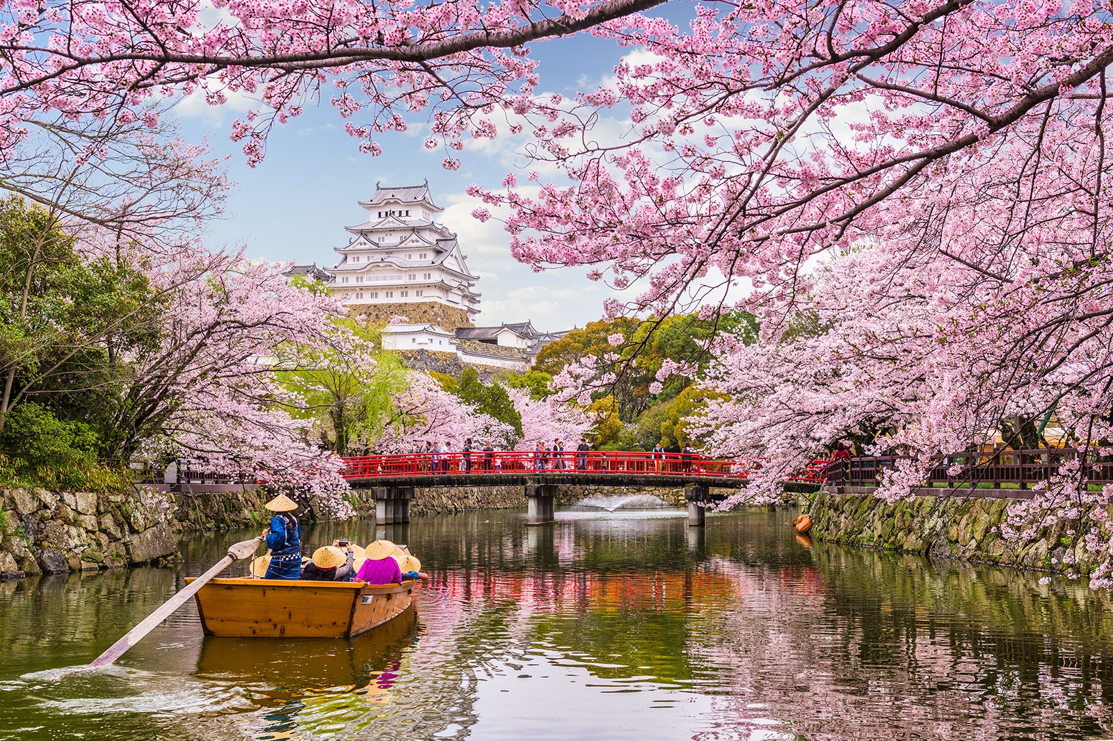 🗽 What Famous Landmark Should You Visit Next Based on Your A-Z Travel Bucket List? Himeji Castle, Japan pink cherry blossoms sakura