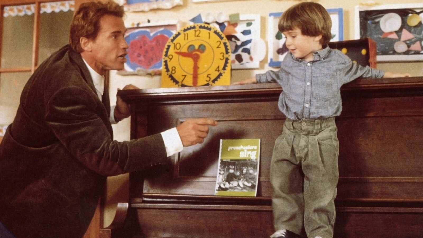How Many of These Classic 90s Movies Can You Identify from Just One Image? Kindergarten Cop 1990
