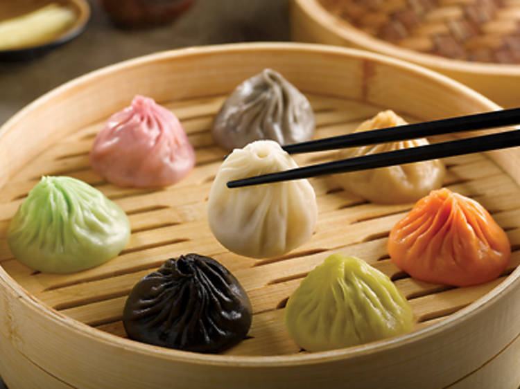 Eat a Mega Meal and We’ll Reveal the Vacation Spot You’d Feel Most at Home in Using the Magic of AI Rainbow colorful Xiaolongbao