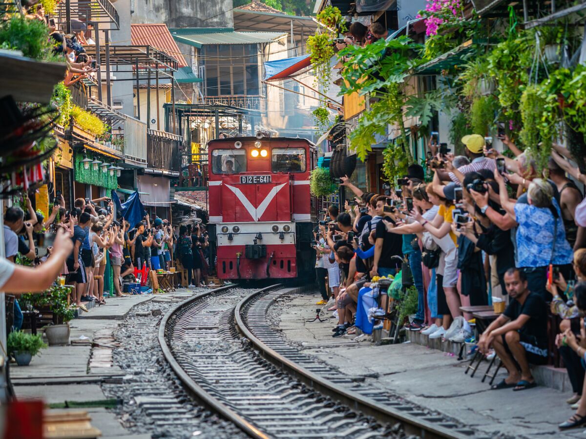 Asian Cities Quiz 🏞️: Can You Identify Them From One Photo? (II) Hanoi train street, railway tracks, Vietnam