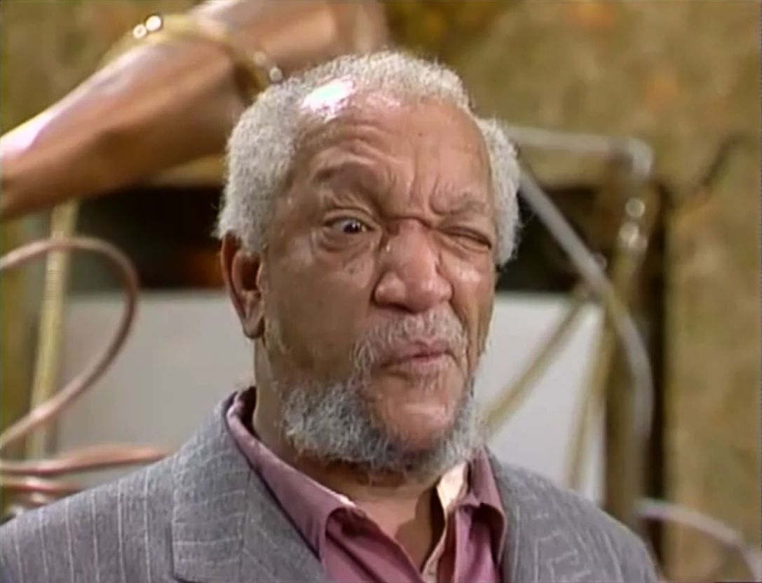 Classic TV Dads Quiz 👔: Match Them To Their Iconic Shows! Redd Foxx as Fred G. Sanford on Sanford and Son