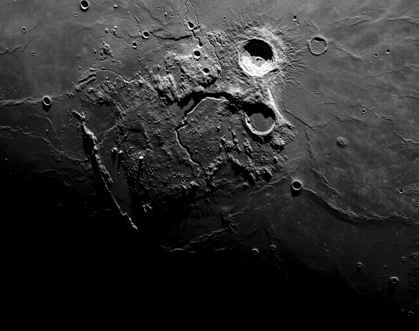 Moon rilles and craters