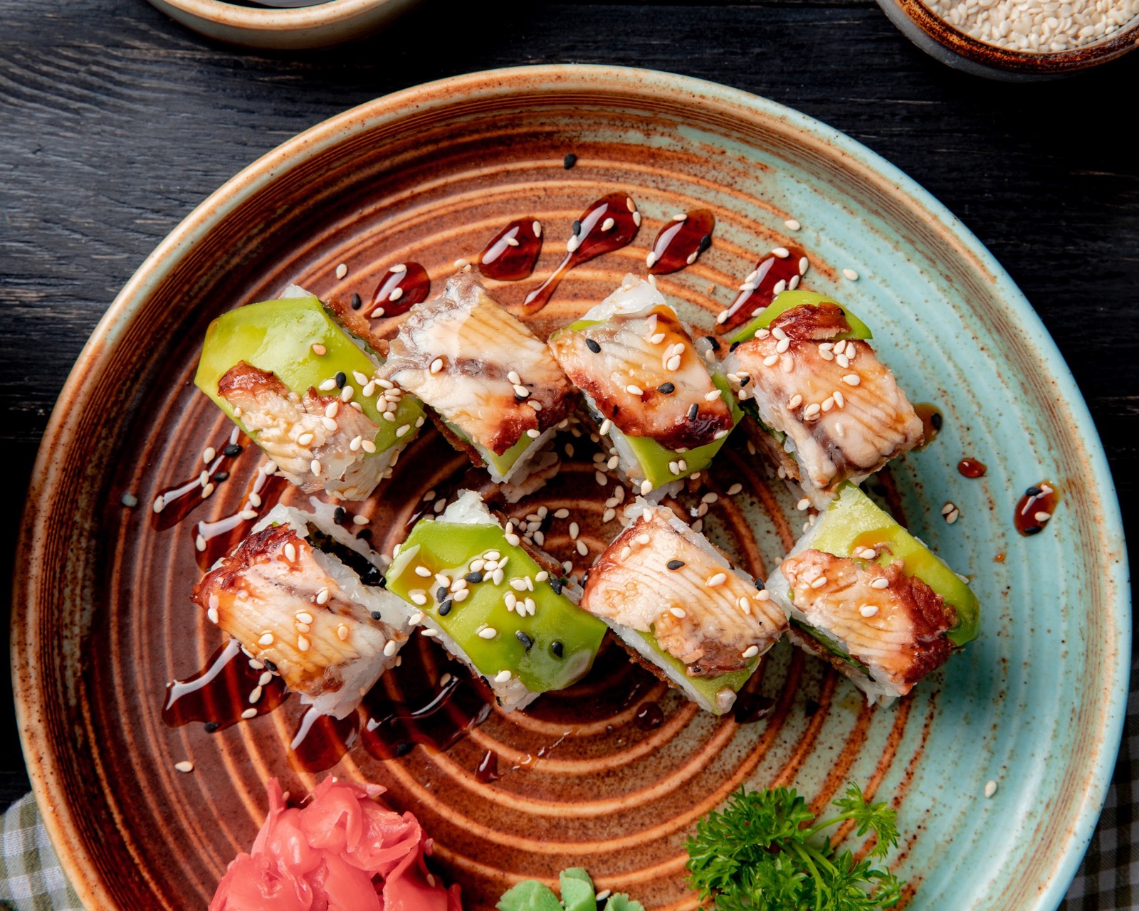 Sushi rolls with eel unagi and avocado