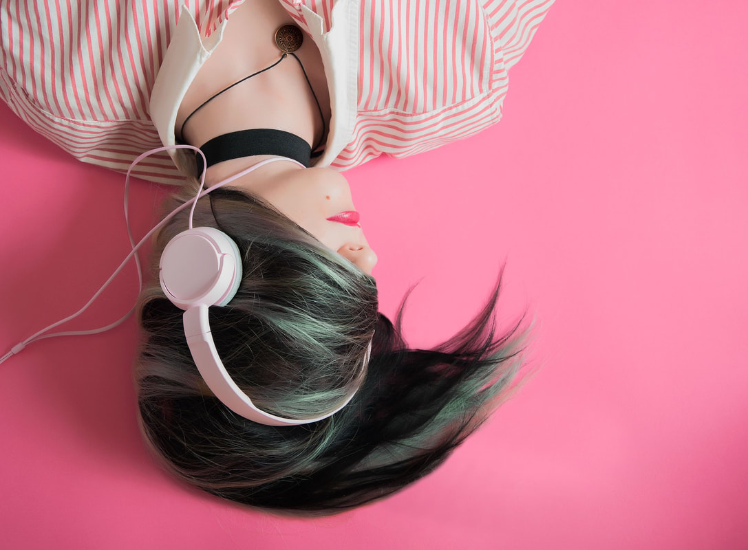 What Color Heart Emoji Are You? Quiz Listening to music
