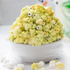 Eat Halloween Snacks To Reveal Your Horror Movie Fate Quiz Slime popcorn with candy eyeballs