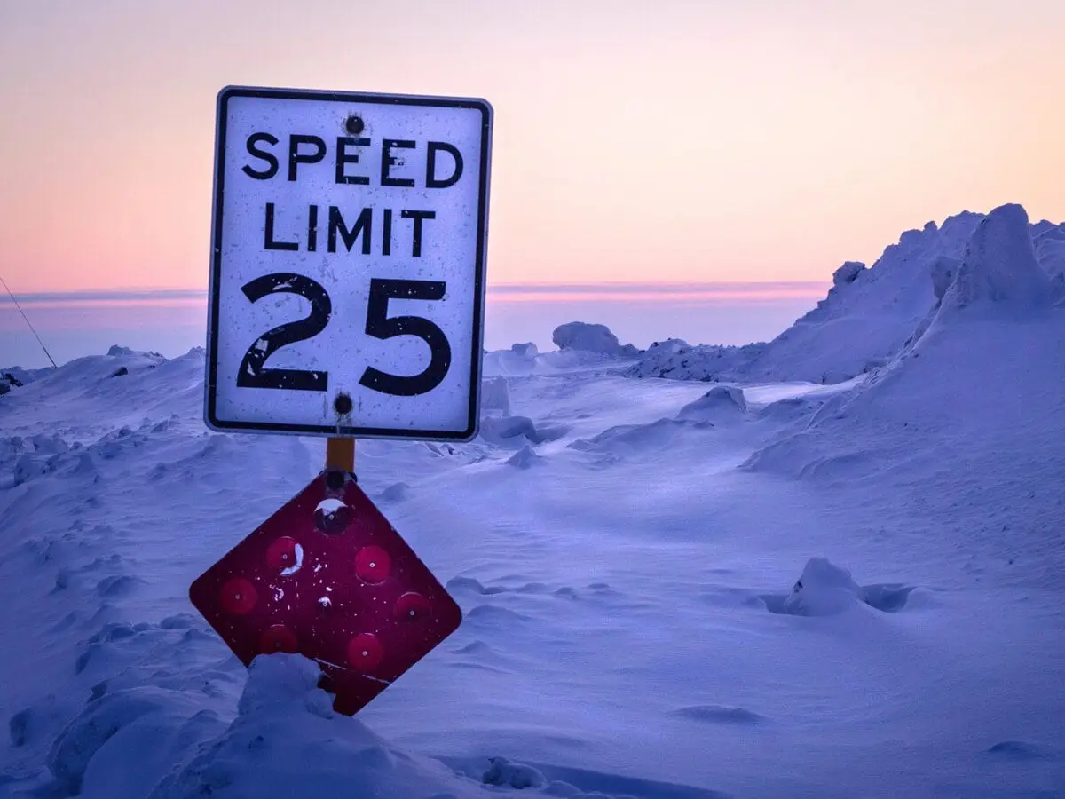 Speed limit sign in Aalaska in winter