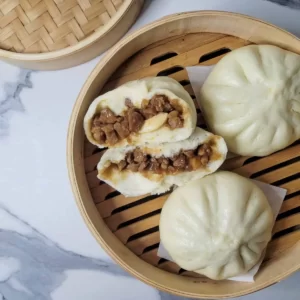 Build World Meal To Know Language You Should Learn Quiz Siopao (Filipino steamed bun)