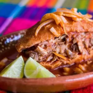 This Street Food Quiz Knows Which Monument You Are Torta ahogada (Mexican \'drowned\' sandwich in spicy sauce)