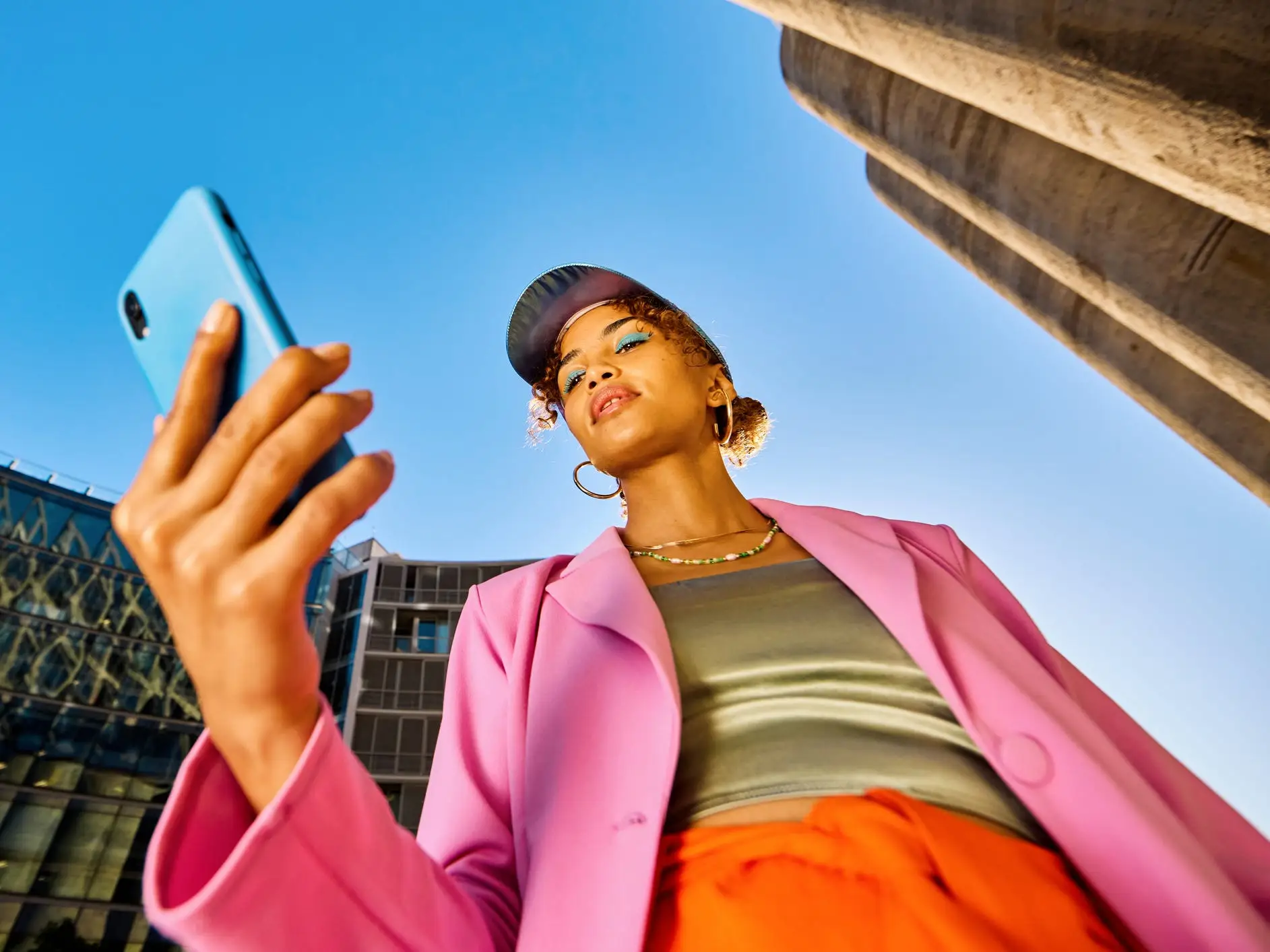 Gen Z young woman using phone