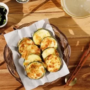 KPop Group-Seoul Travel Quiz Hobak jeon (pan-fried zucchini)