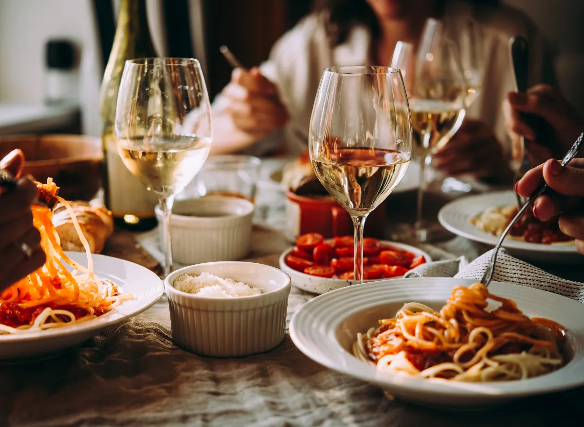 Pasta Love Analysis Quiz Friends having pasta dinner at Italian restaurant